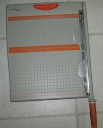 Guillotine trimmer used in scrapbook and card making