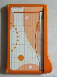 Small guillotine trimmer used in scrapbook and card making